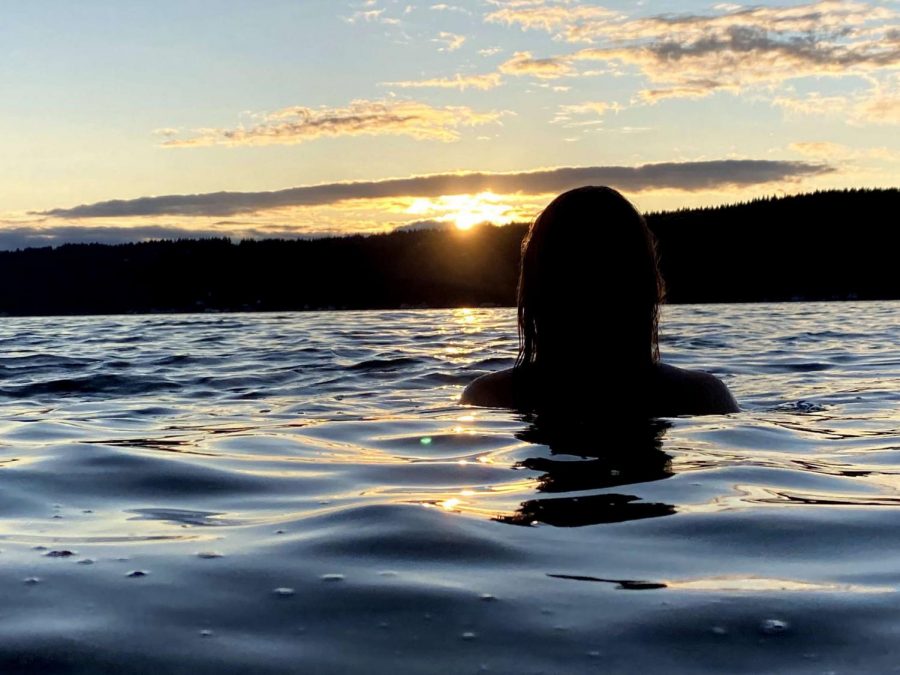 Junior Christina Harisov, enjoys some peaceful time in the lake at Twanoh state park in Union, Washington.