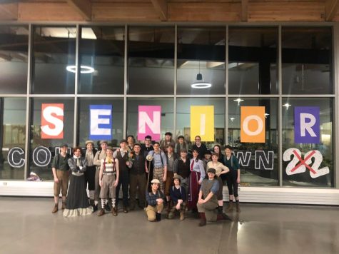 The Cast of Newsies under the seniors sign
