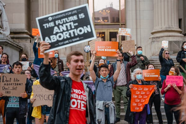 Protestors show their opinions on the matter.