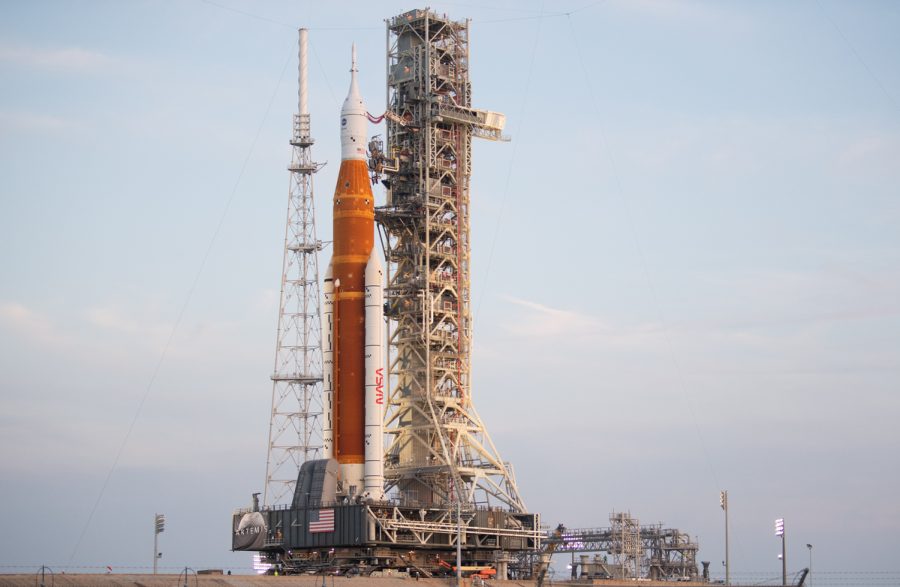 NASA%E2%80%99s+Space+Launch+System+%28SLS%29+rocket+with+the+Orion+spacecraft+aboard+is+seen+atop+the+mobile+launcher+as+it+is+rolled+up+the+ramp+at+Launch+Pad+39B%2C+Wednesday%2C+Aug.+17%2C+2022%2C+at+NASA%E2%80%99s+Kennedy+Space+Center+in+Florida.+NASA%E2%80%99s+Artemis+I+mission+is+the+first+integrated+test+of+the+agency%E2%80%99s+deep+space+exploration+systems%3A+the+Orion+spacecraft%2C+SLS+rocket%2C+and+supporting+ground+systems.+Launch+of+the+uncrewed+flight+test+is+targeted+for+no+earlier+than+Aug.+29.+Photo+Credit%3A+%28NASA%2FJoel+Kowsky%29