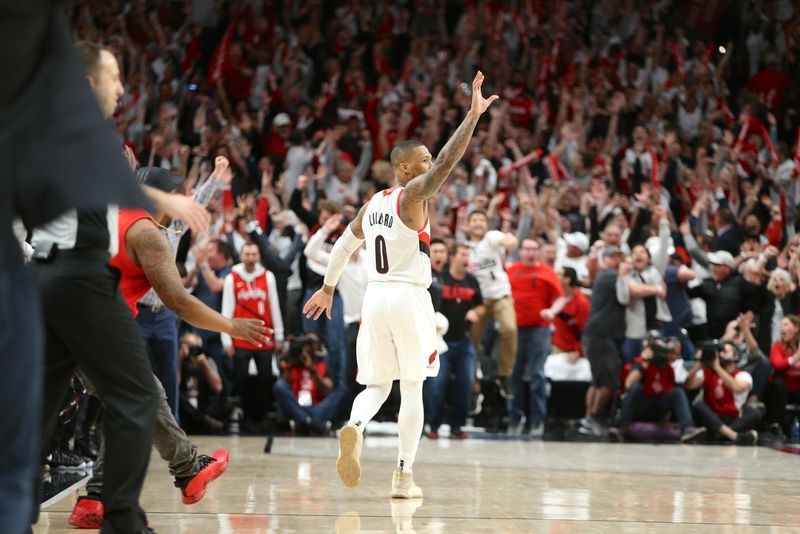 Damion Lillard waves goodbye to the Oklahoma City Thunder after hitting the game winning three  pointer in game five of the first round of playoffs on April 23, 2019 at the Moda Center.