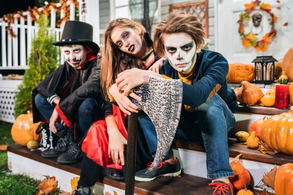 Teenagers dressed up for Halloween