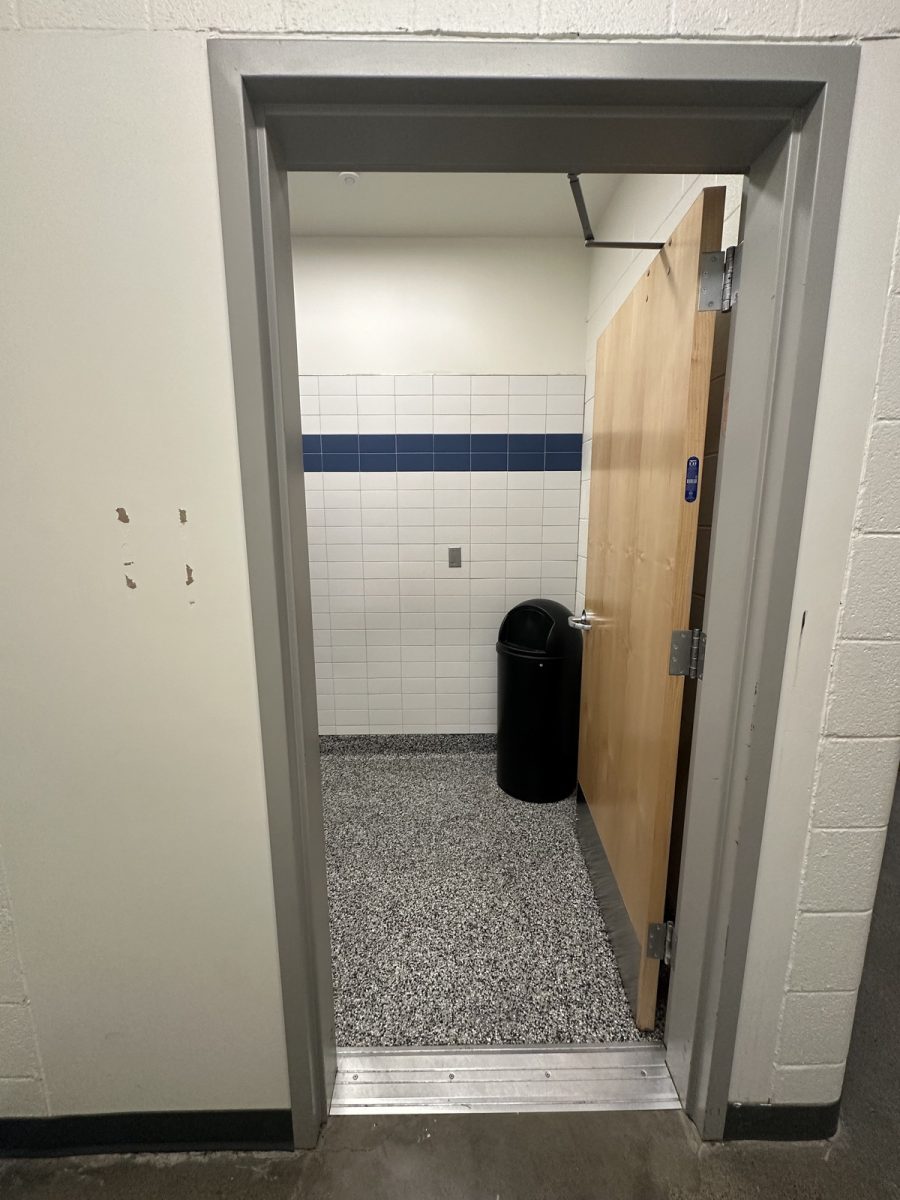 Bathroom door permanently propped open in 300 hall