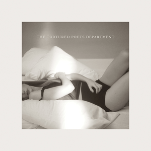 The tortured poet herself on the album’s main cover.