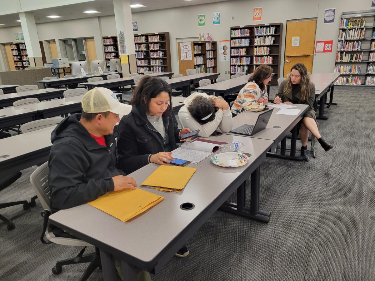 Students applying for the  FASFA and ORSAA during the FASFA and ORSAA Help Night on January 9, 2025.