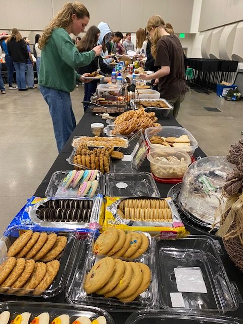  Band students line up to fill their plates with all the delicious food at Band Thanksgiving this past November.  