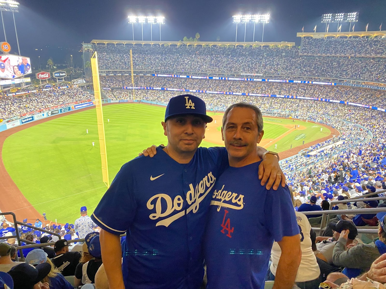 Rethwill and his older brother at the second game of the World Series, cheering on the Dodgers.
