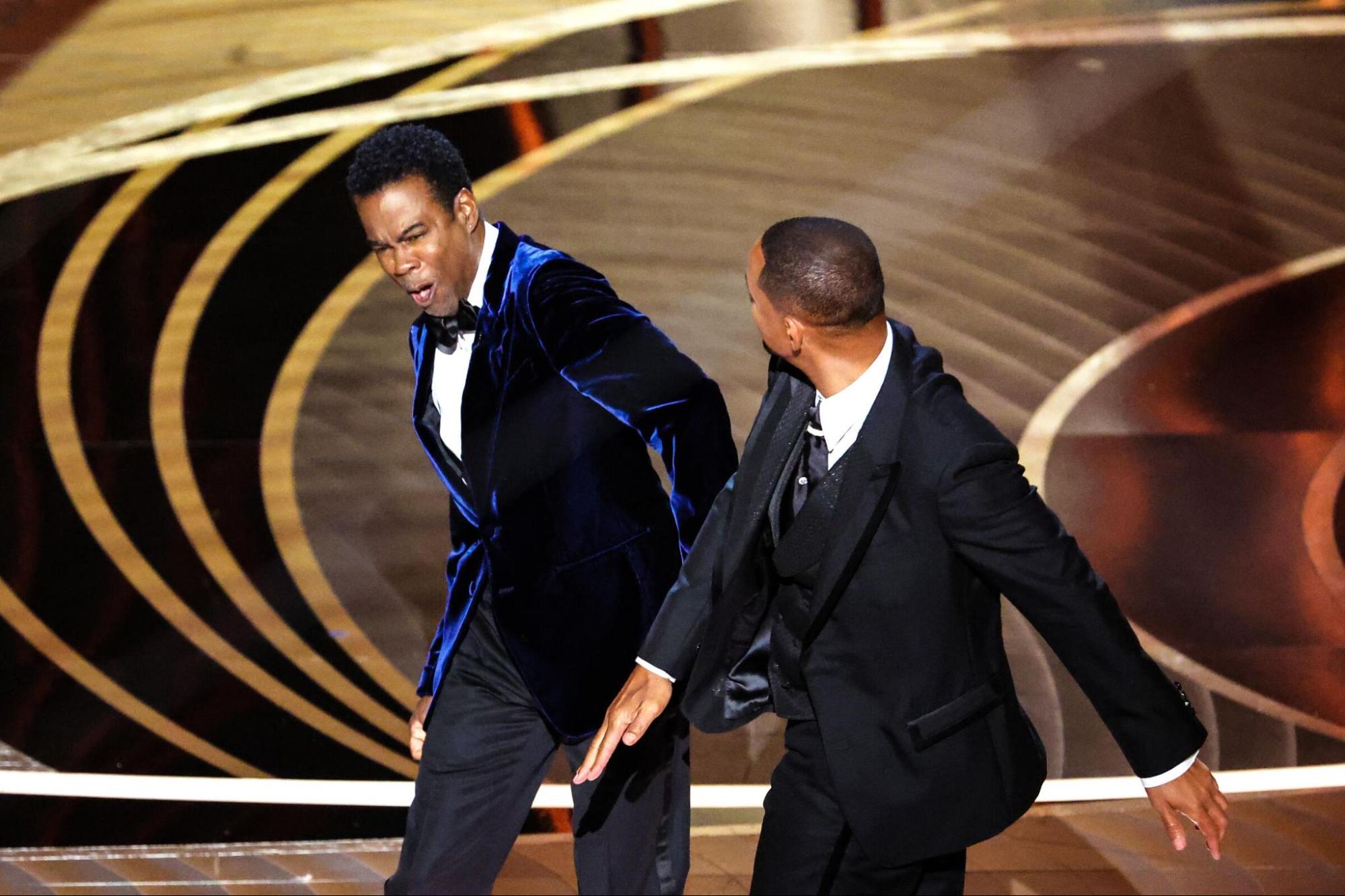 Will Smith slaps Chris Rock on the face during the Oscars, March 27, 2022. 