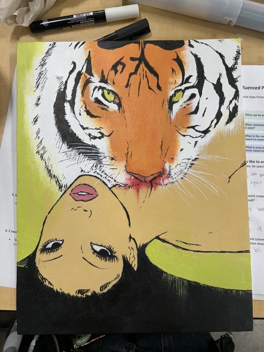  Melina Tucker’s acrylic painting The Feline and the Fawn depicting a tiger representative of society and media preying on young women was on display at the Mt. Hood Art Show from April 7 to April 24.