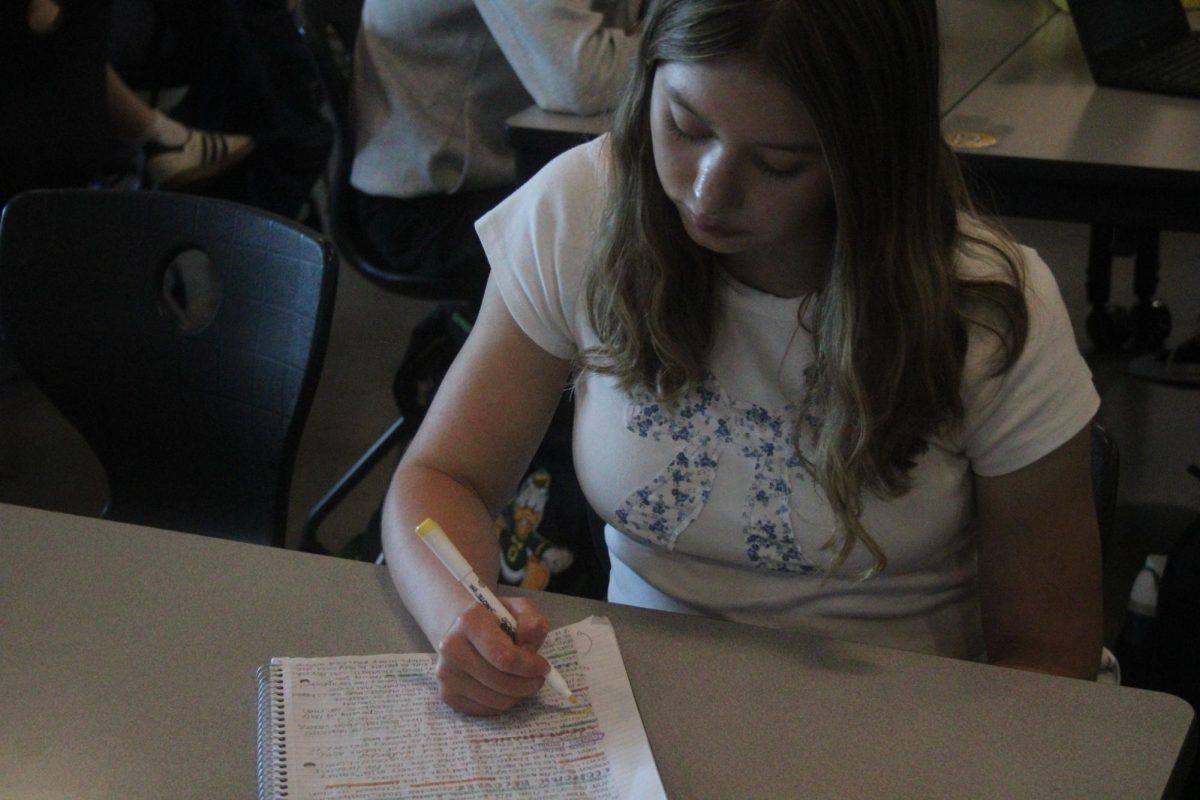 Sam Barlow High School AP student, Brennah Rinard, works on her notes for AP European History during a study hall.