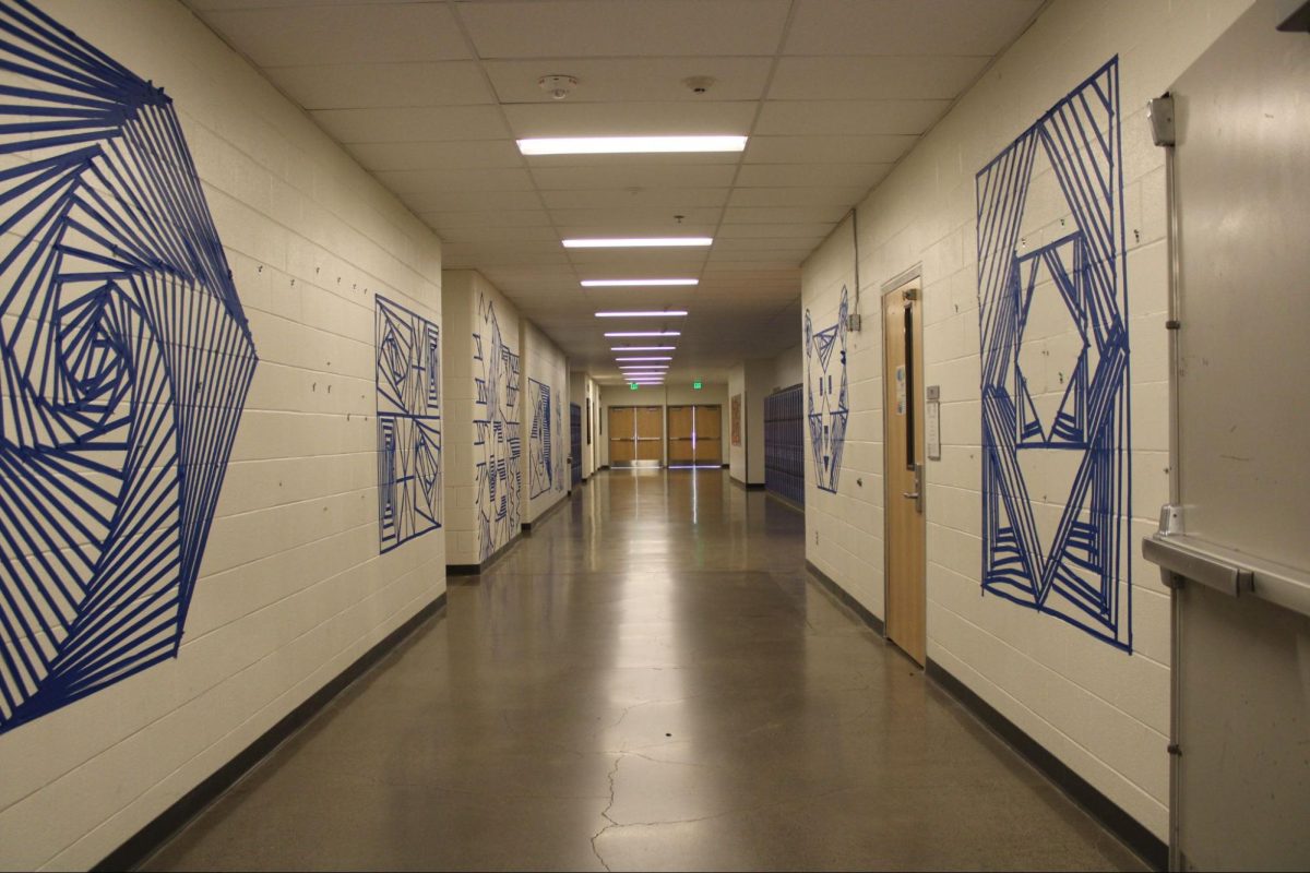 Barlow students tape murals to fill 300 halls for the 2025-‘26 school year.