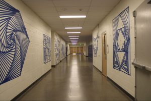 Barlow students tape murals to fill 300 halls for the 2025-‘26 school year.
