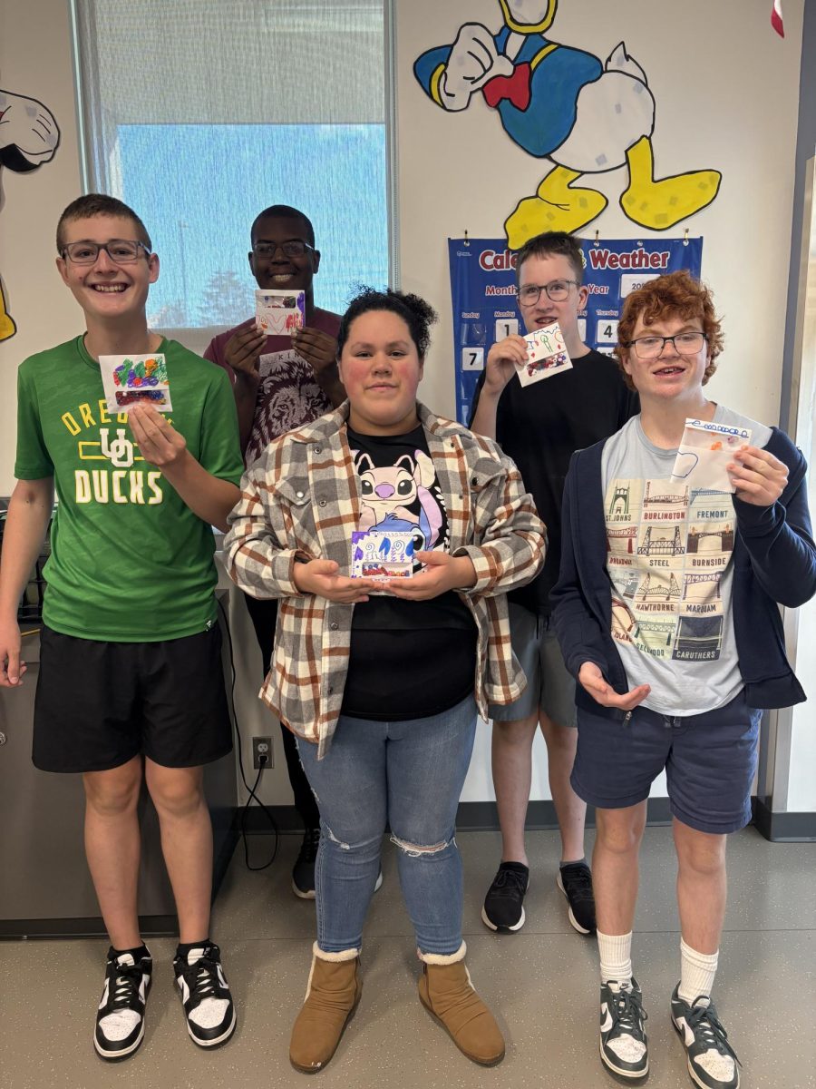 Sam Barlow's special education class takes a group photo after a project.