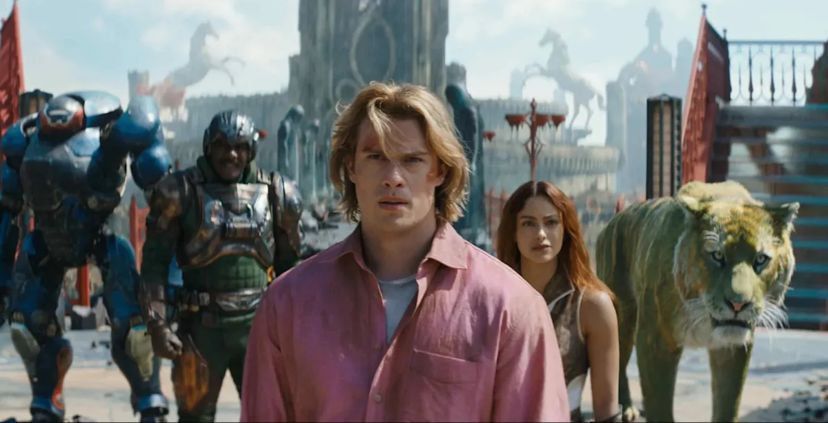 Official Look at The Masters of the Universe: (Right-to-Left) Kristen Wiig as Roboto, Idris Elba as Man-At-Arms, Nicholas Galitzine as Prince Adam, and Camila Mendes as Teela