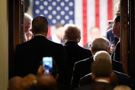 Donald Trump walking into the State of the Union address in Washington D.C. on Tuesday, February 24, 2026, to get a message to the country of how it has been operating for the last year. 
