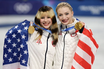 Team USA’s Alysa Liu and Amber Glen after winning their gold medals in the 2026 Winter Olympics. 