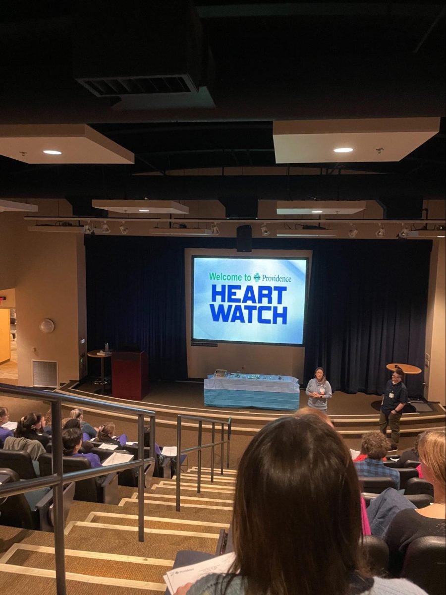 The Anatomy students attending the most recent field trip to Providence, watching a presentation before they attend an open heart surgery 