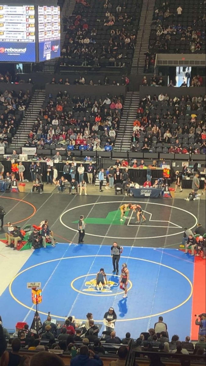  Wrestlers in action at Veterans Memorial Coliseum in Portland, Oregon, for the OSAA State Wrestling competition on February 27th