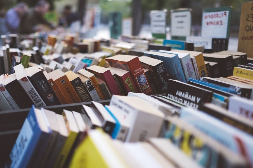  Rows of High School Textbooks stored in a school library waiting for student use.
