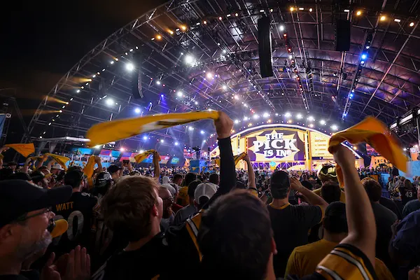 Pittsburgh fans part of the 805,000 celebrating their pick on April 23rd in Acrisure Stadium.