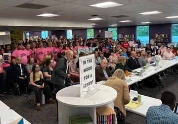  People pack a budget committee meeting of the Gresham-Barlow School District at Clear Creek Middle School on Wednesday, April 29, 2026.